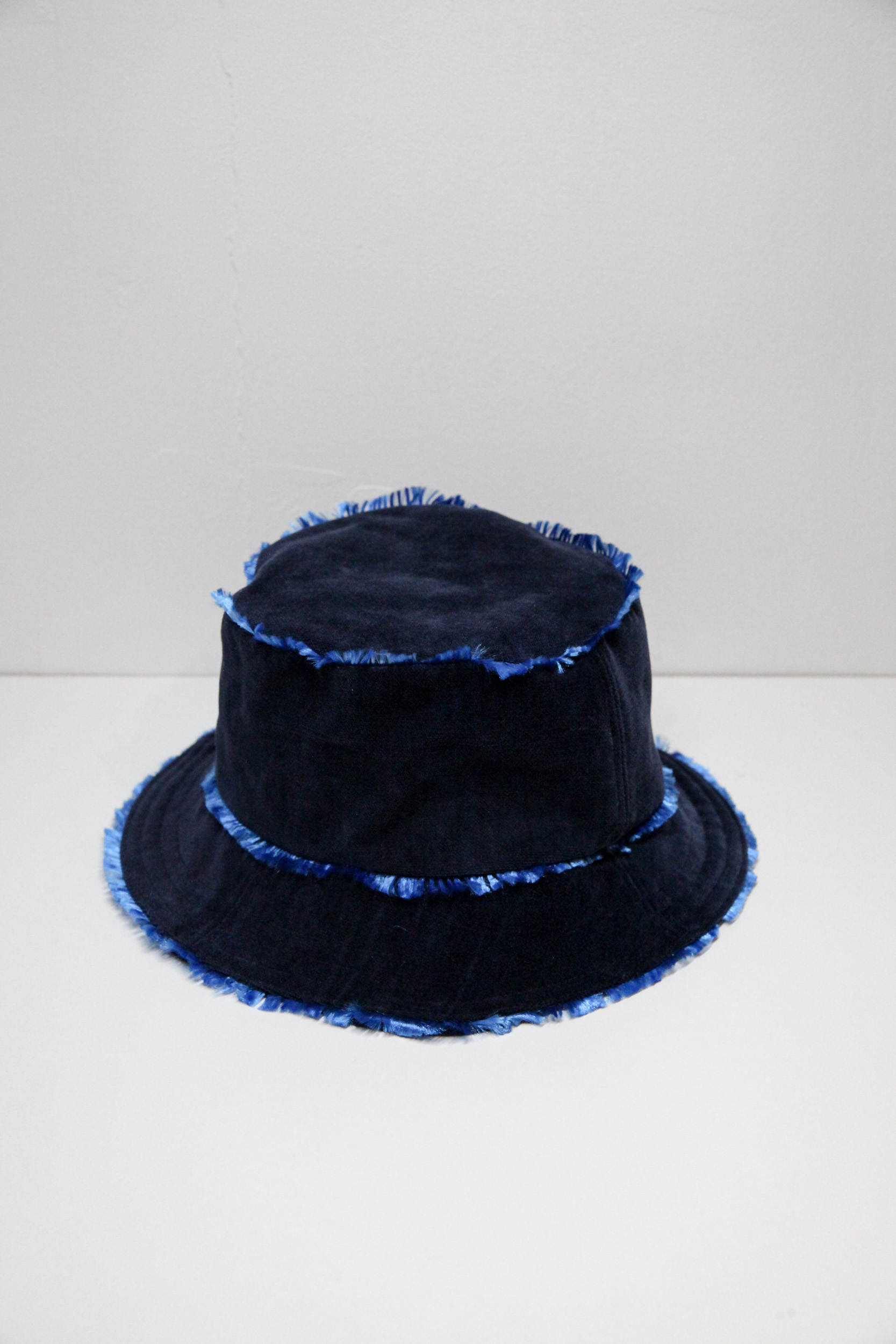 Velvet midnight blue bucket hat with flashy lining