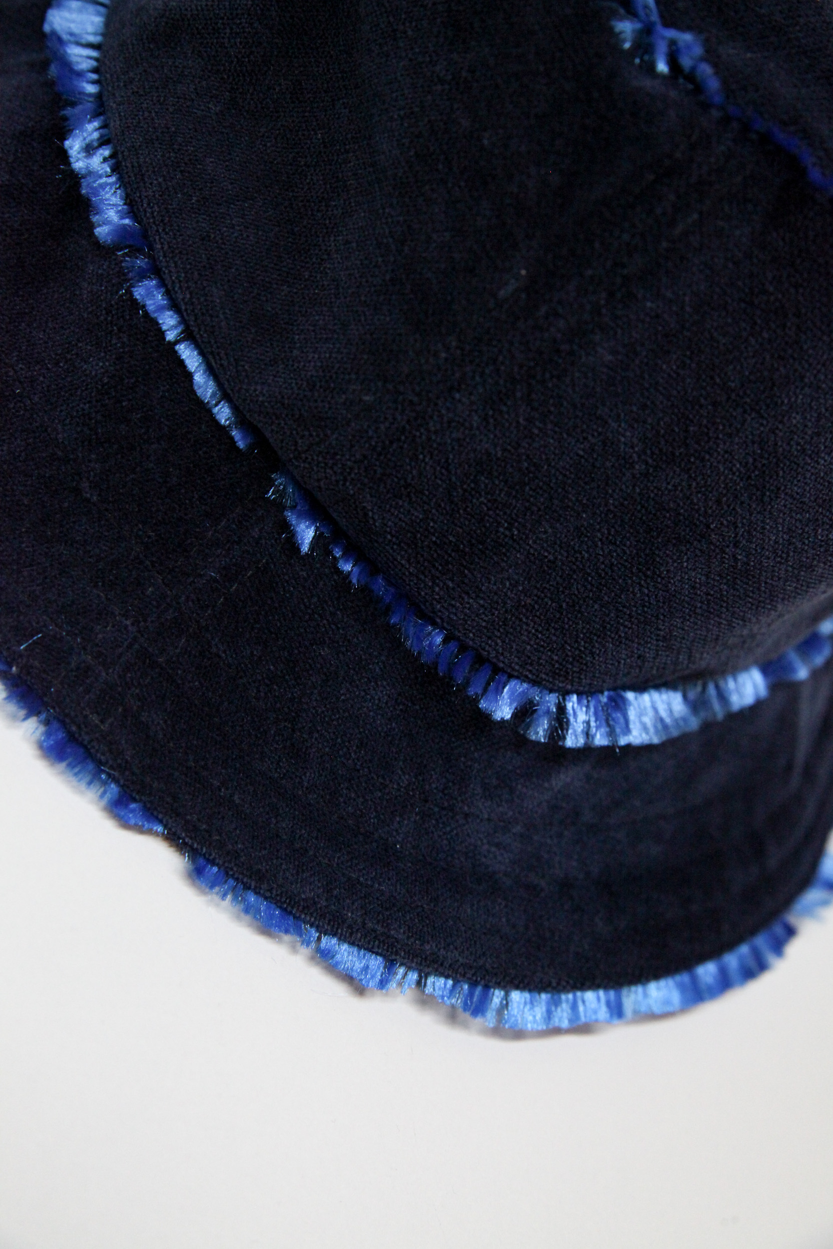 Velvet midnight blue bucket hat with flashy lining