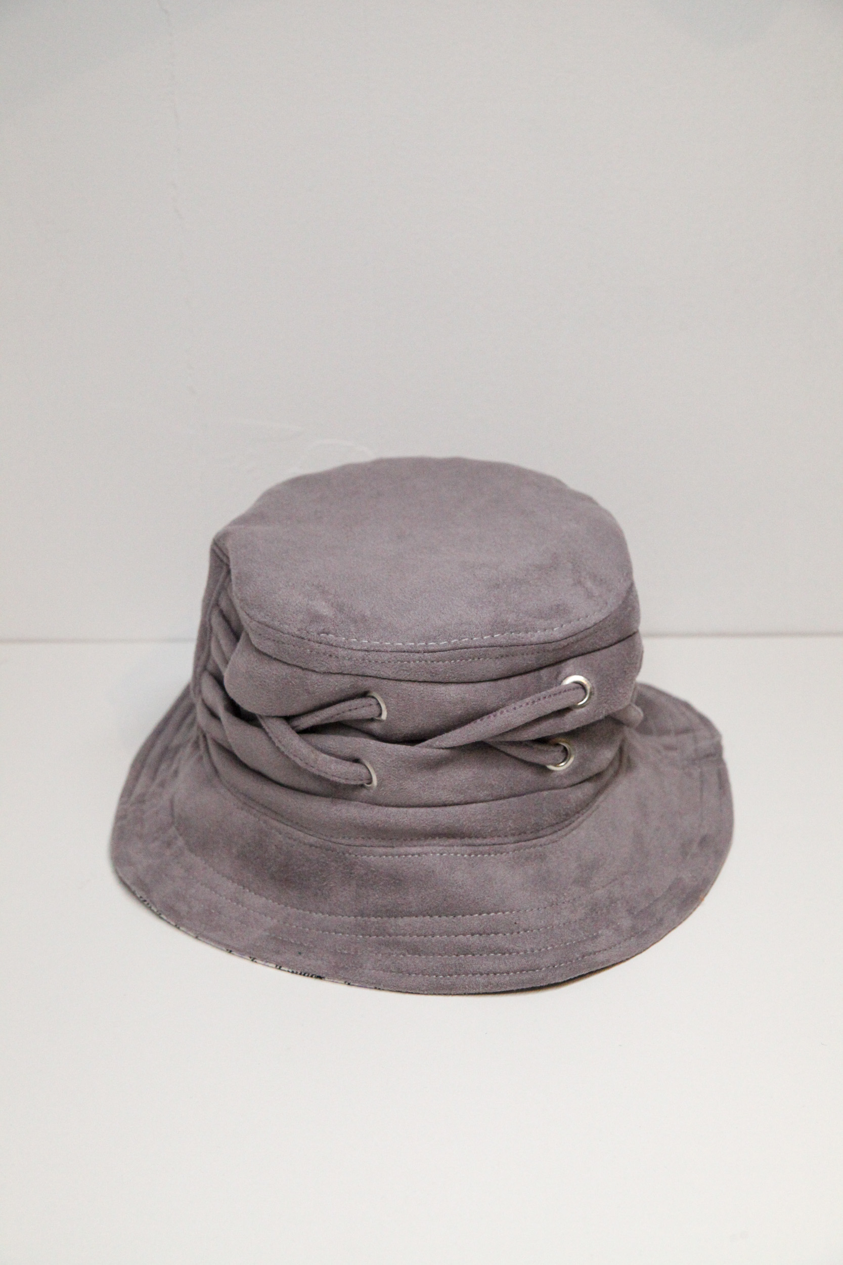 Dark beige velvet bucket hat with decorative braid