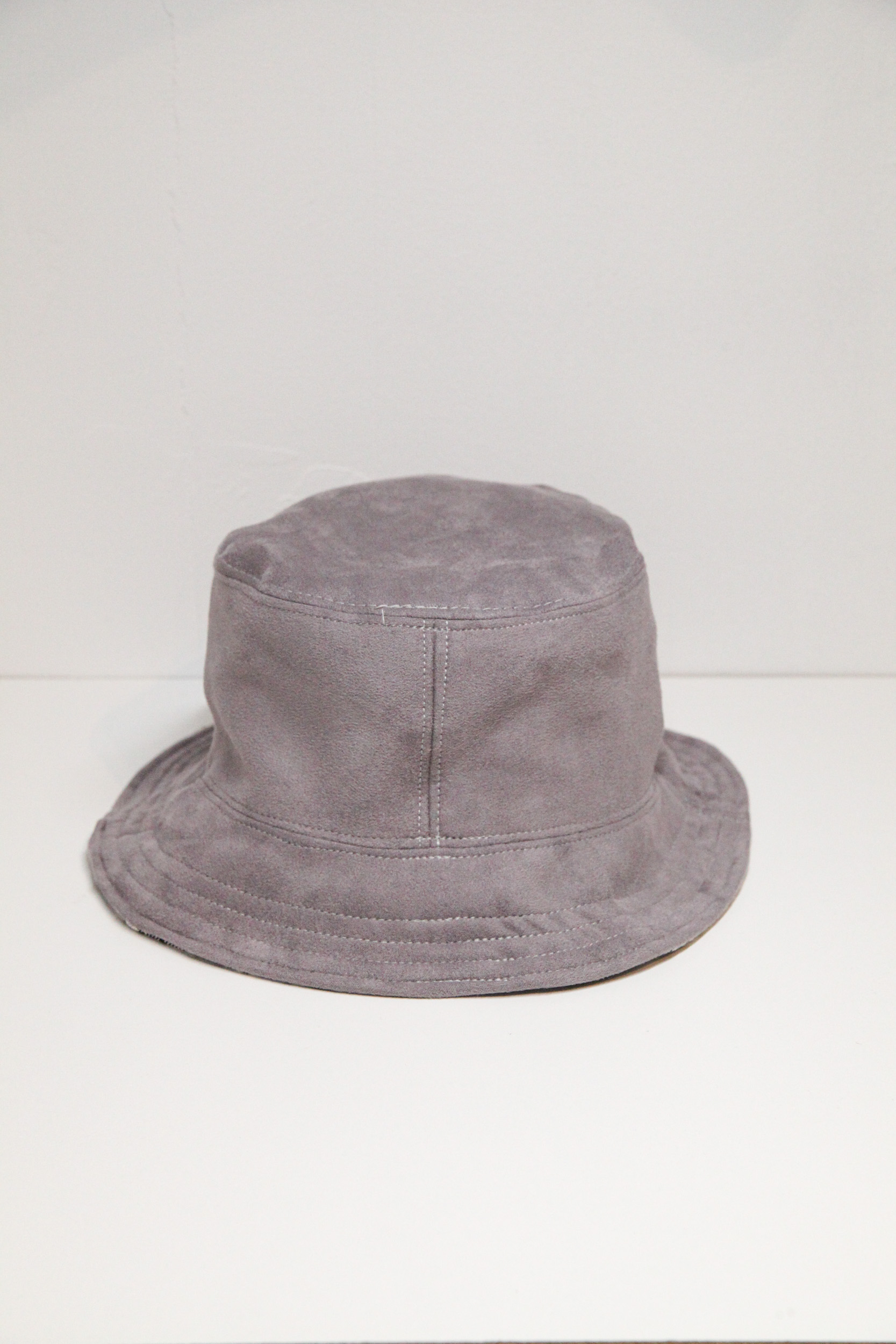 Dark beige velvet bucket hat with decorative braid