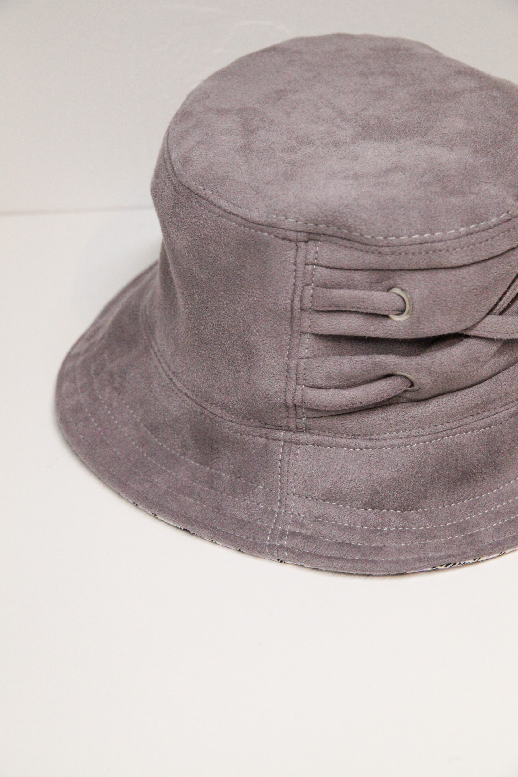 Dark beige velvet bucket hat with decorative braid