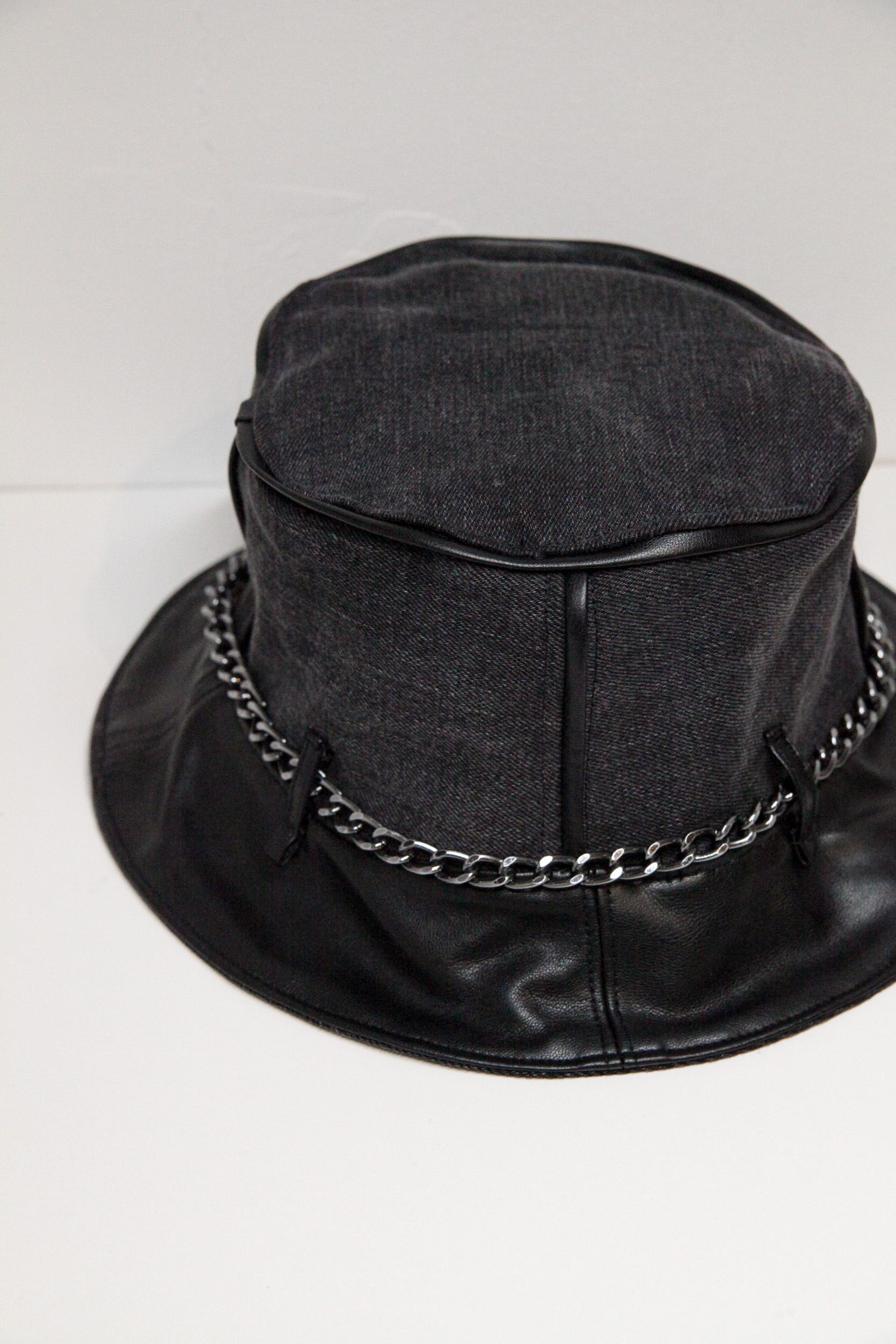 Black and grey bucket hat with chain and pocket on front