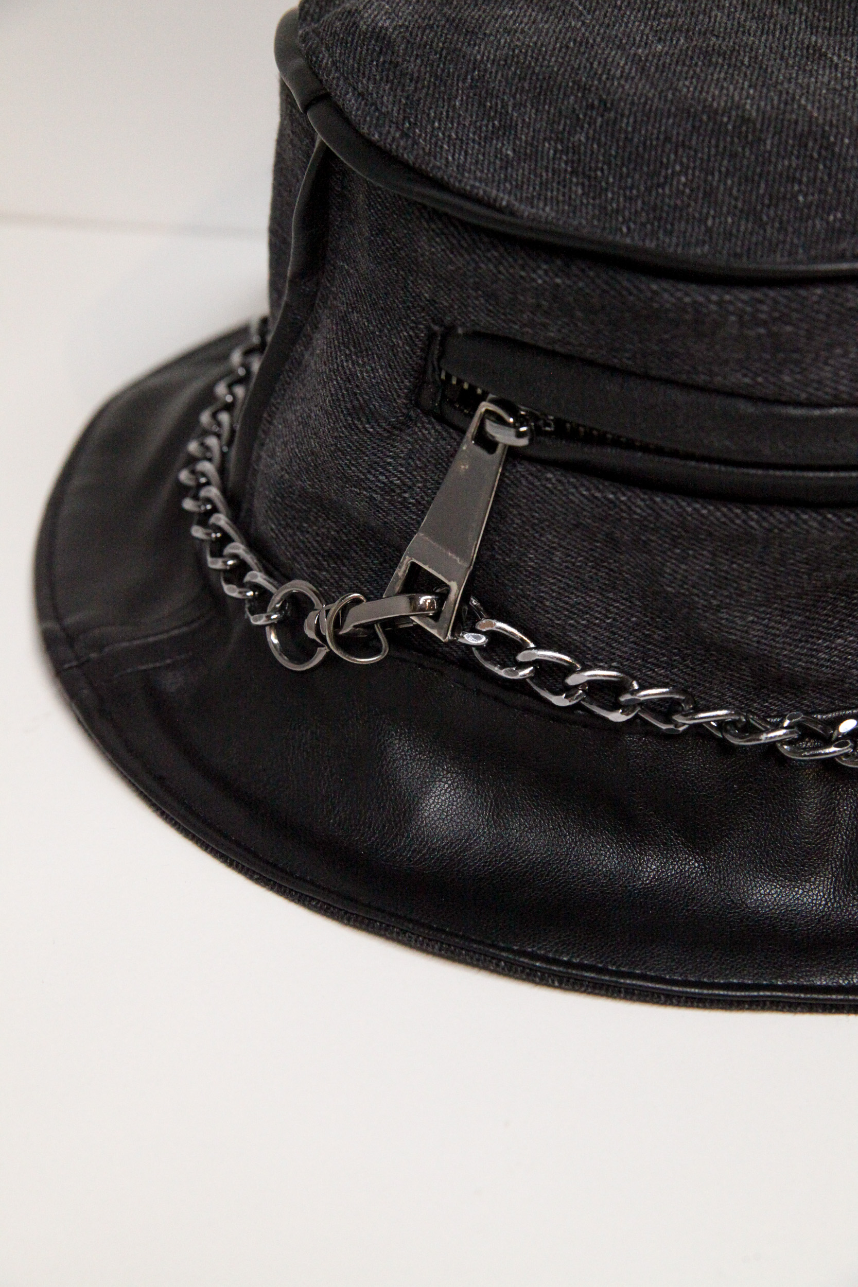 Black and grey bucket hat with chain and pocket on front