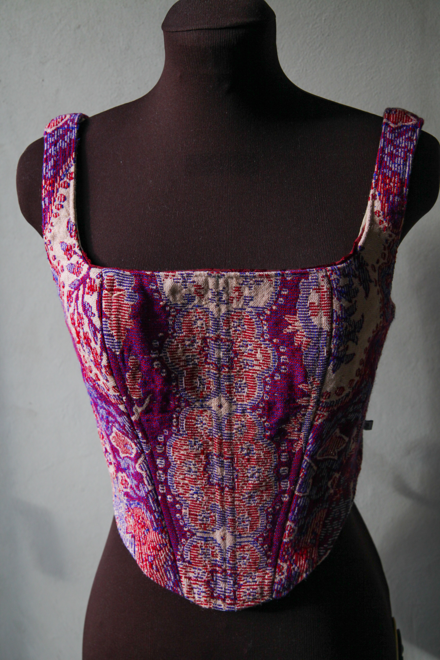 Corset top made of fabric with vintage pink, red and purple print, upcycled