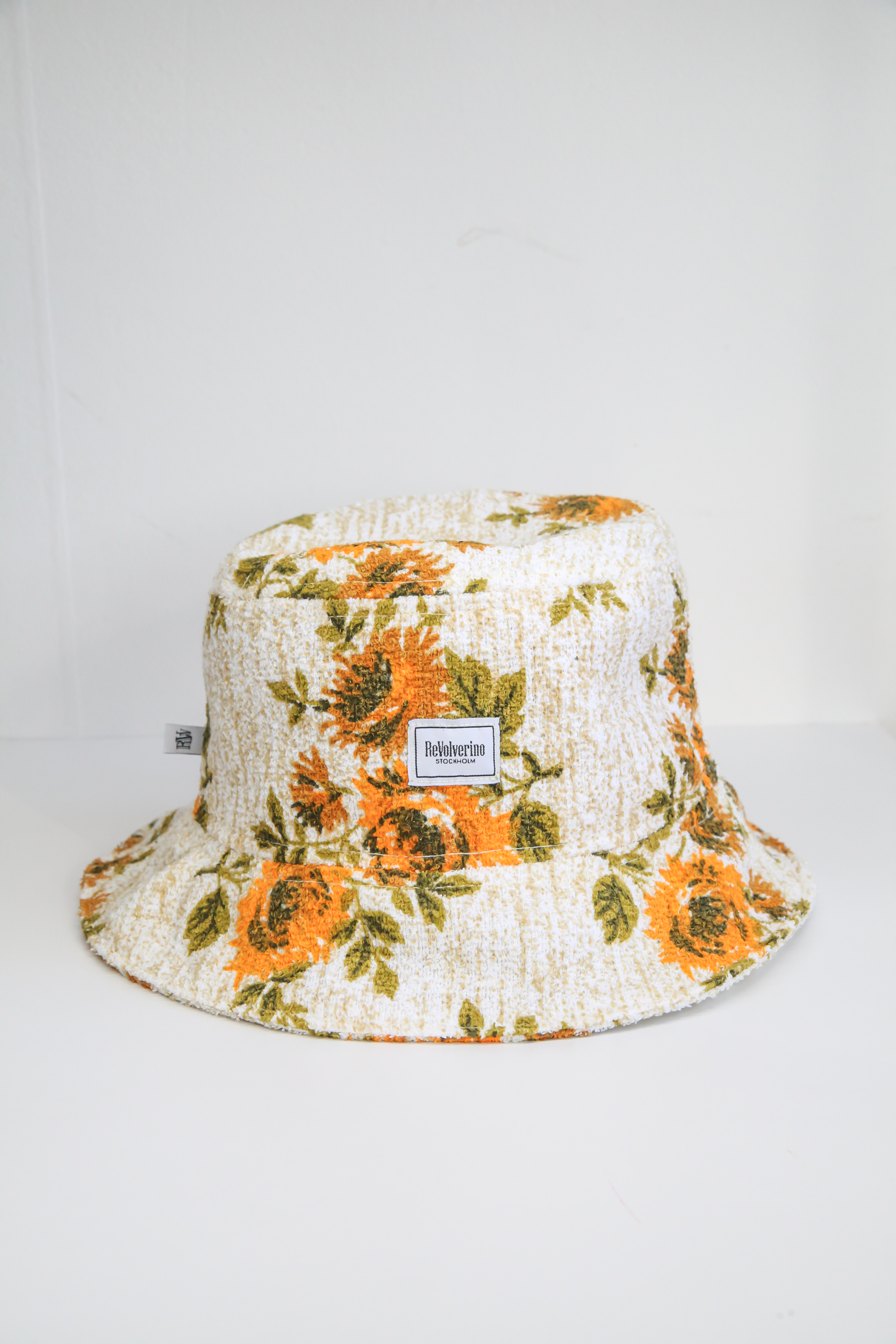 Beige bucket hat summer with floral pattern sunflowers