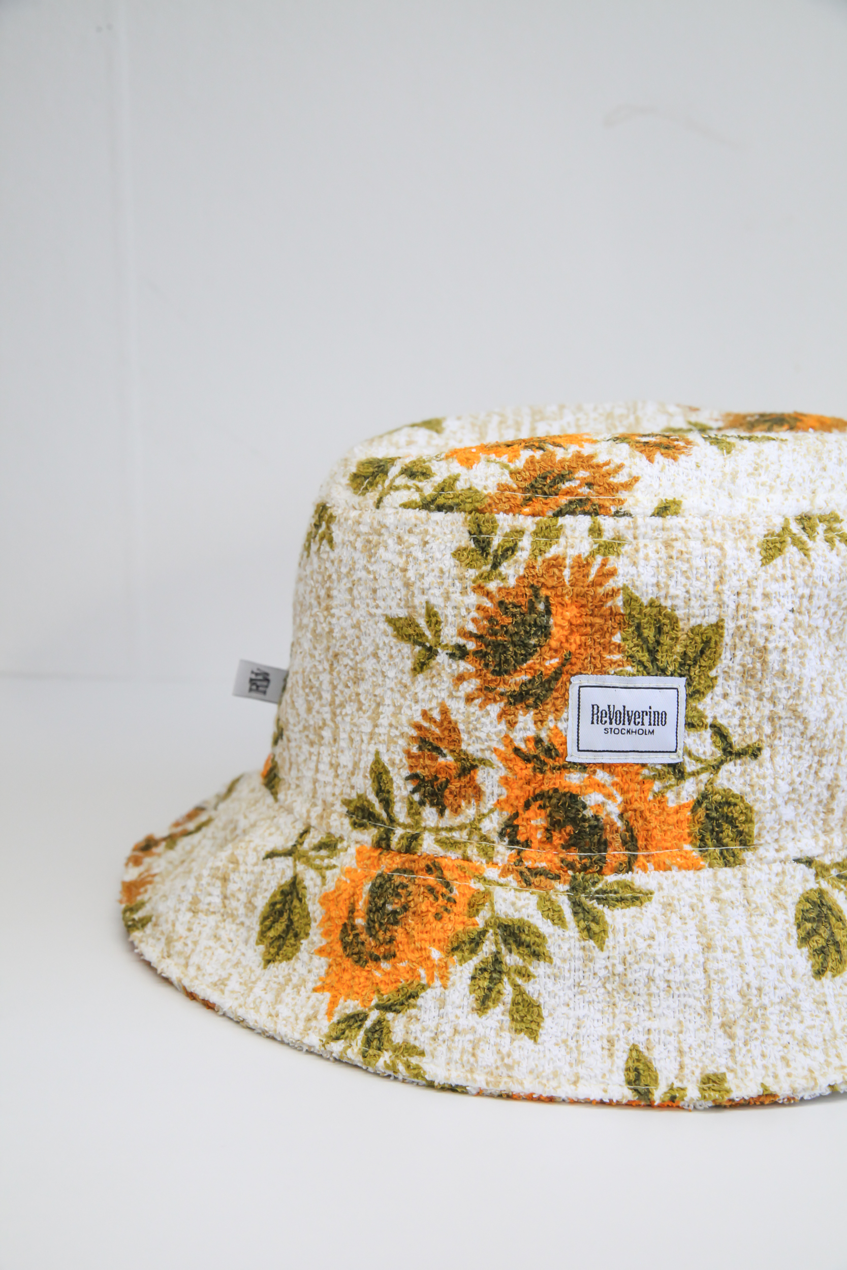 Beige bucket hat summer with floral pattern sunflowers