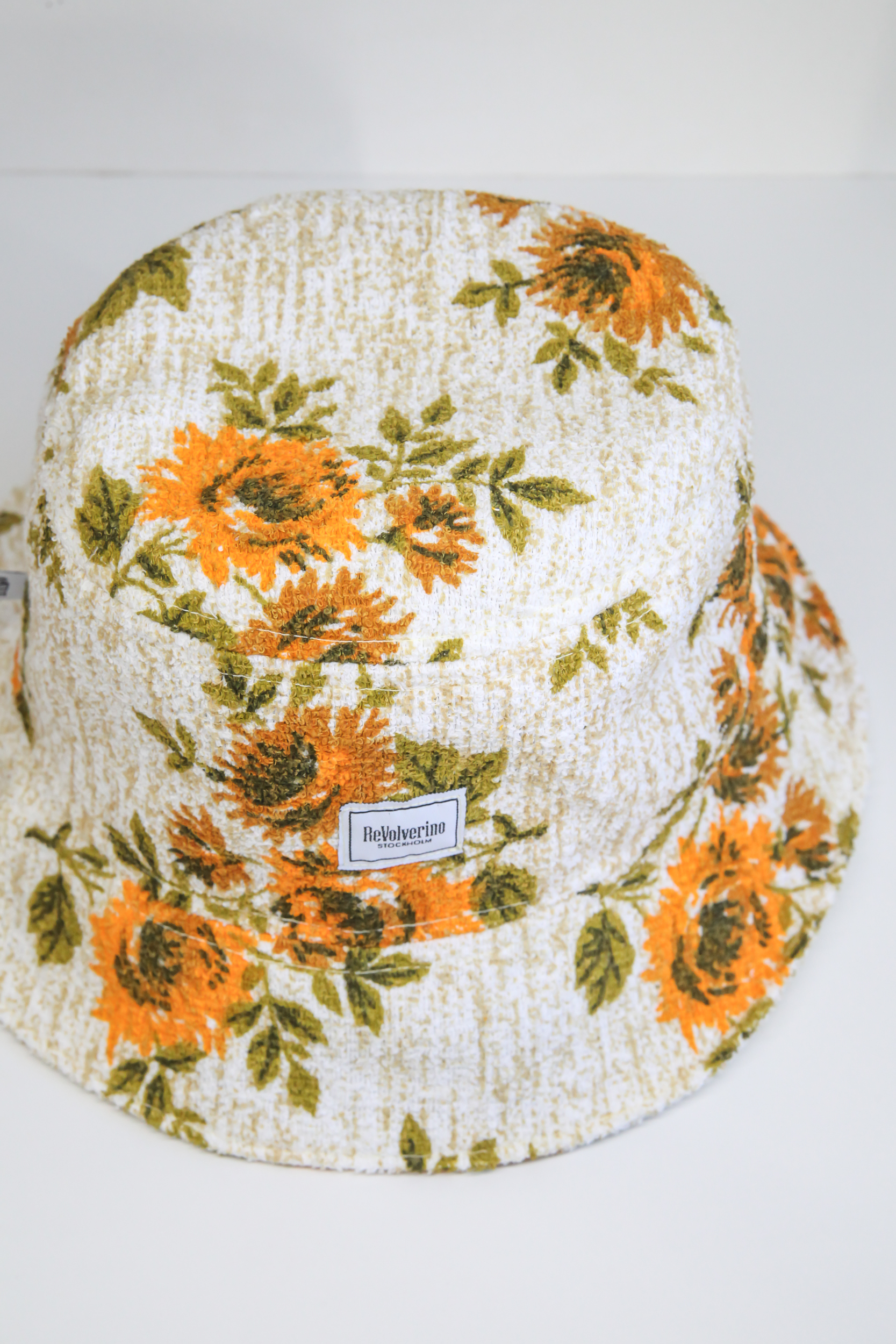 Beige bucket hat summer with floral pattern sunflowers