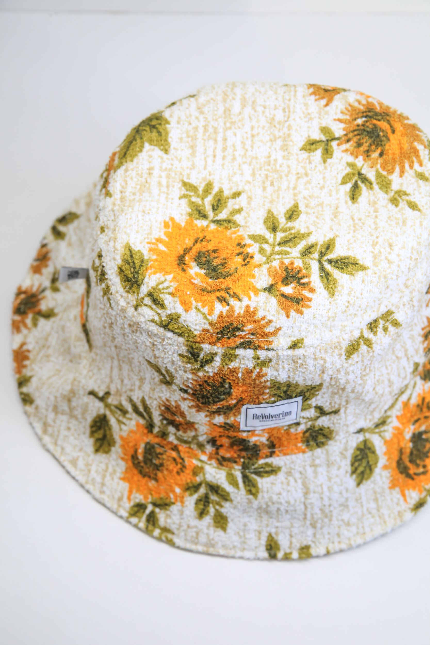 Beige bucket hat summer with floral pattern sunflowers