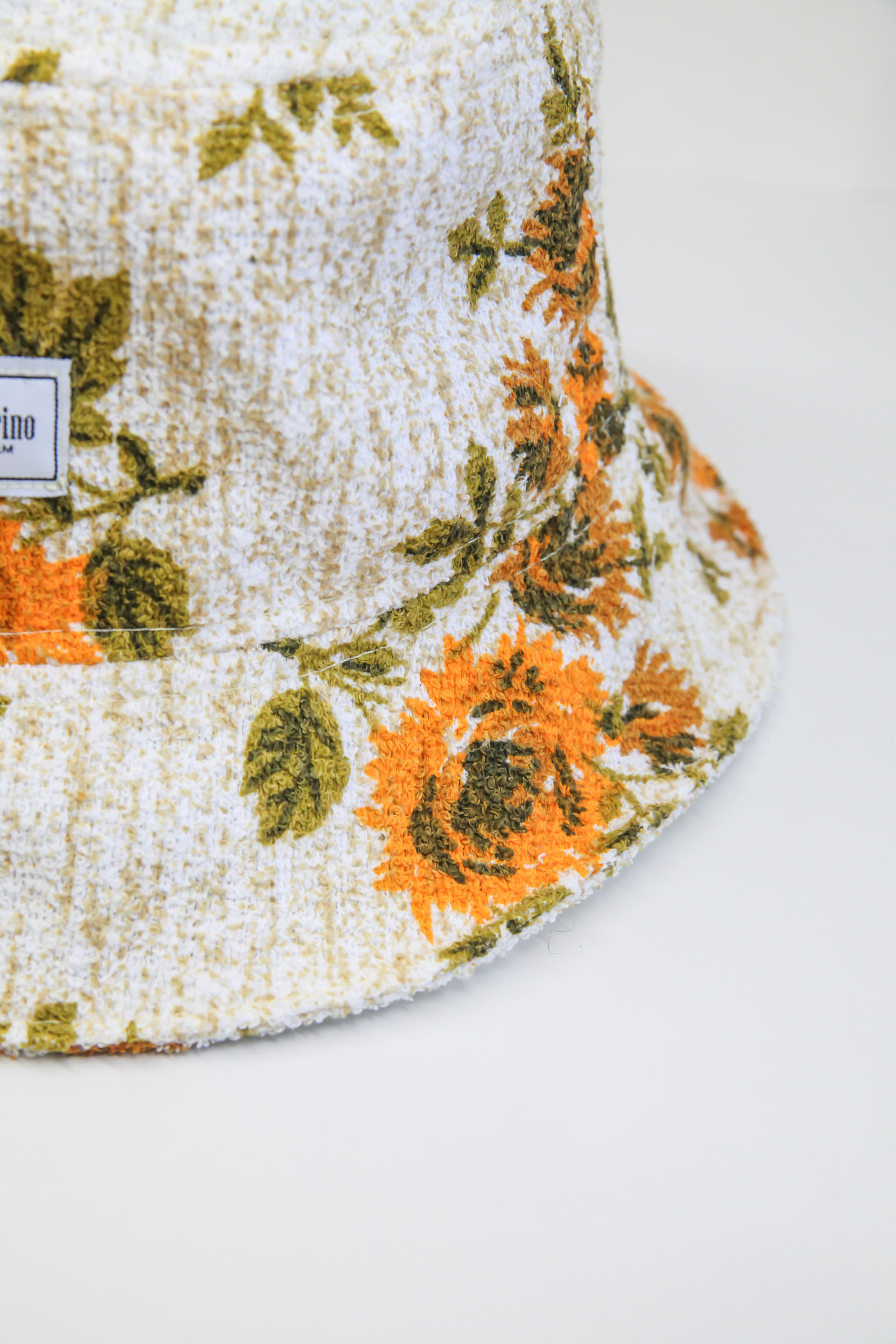 Beige bucket hat summer with floral pattern sunflowers