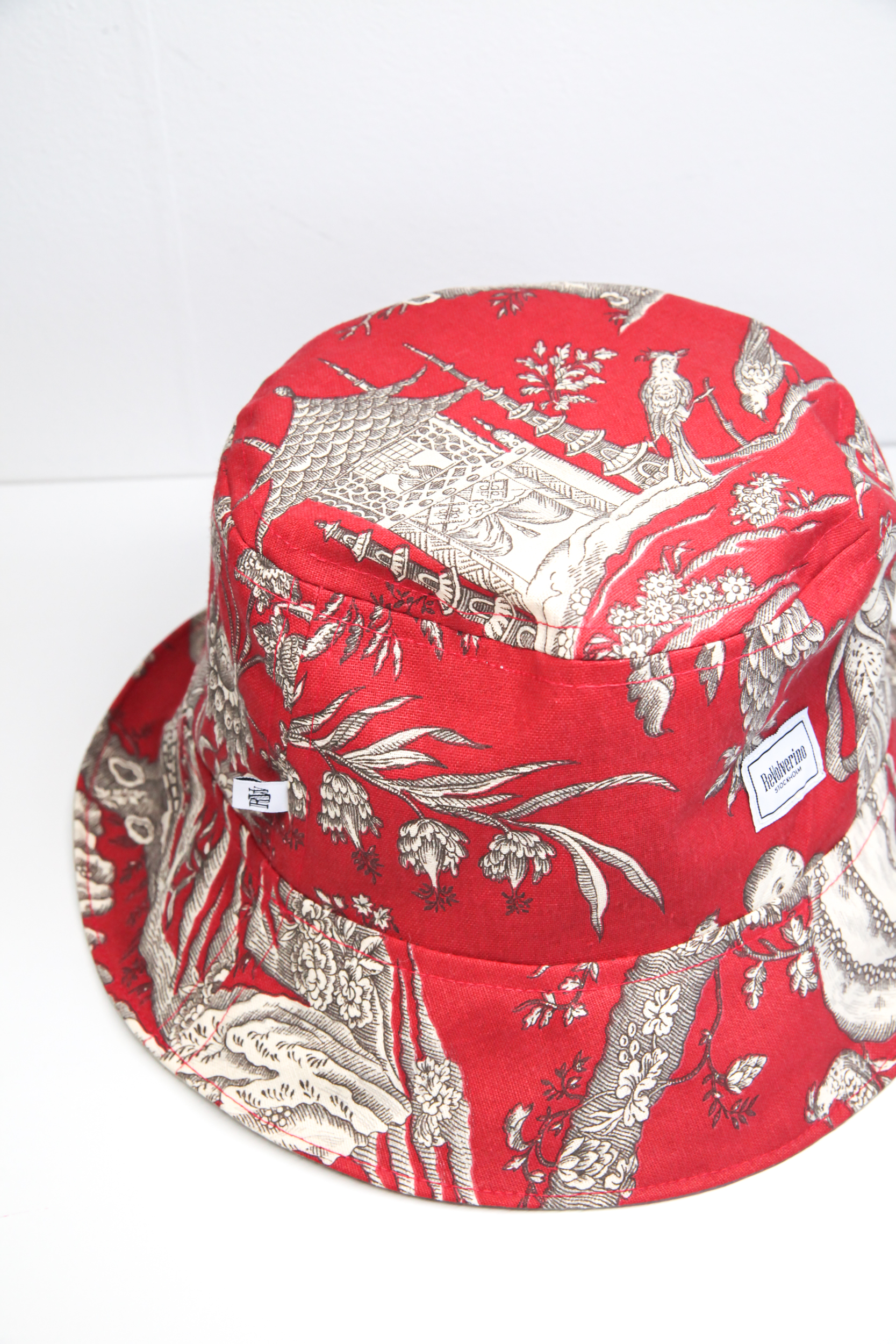 Red burgundy bucket hat with vintage Chinese pattern print