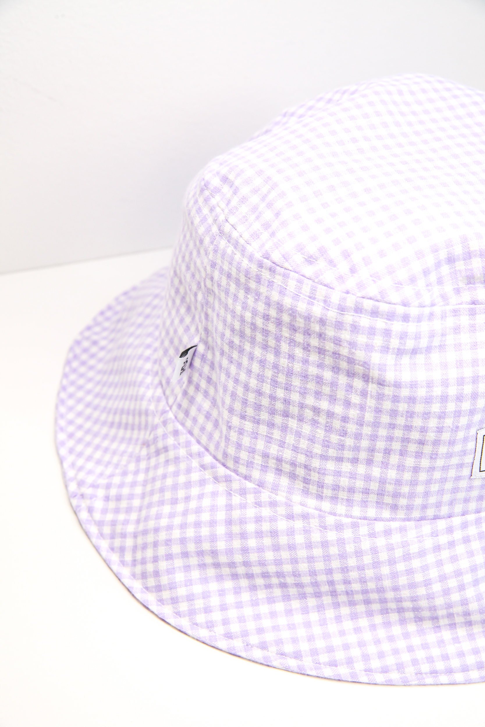 Summer bucket hat with checkered baby purple pattern