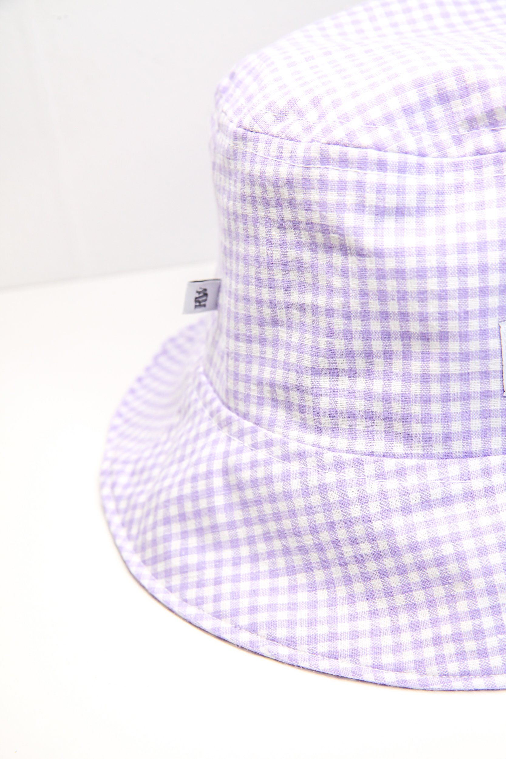 Summer bucket hat with checkered baby purple pattern