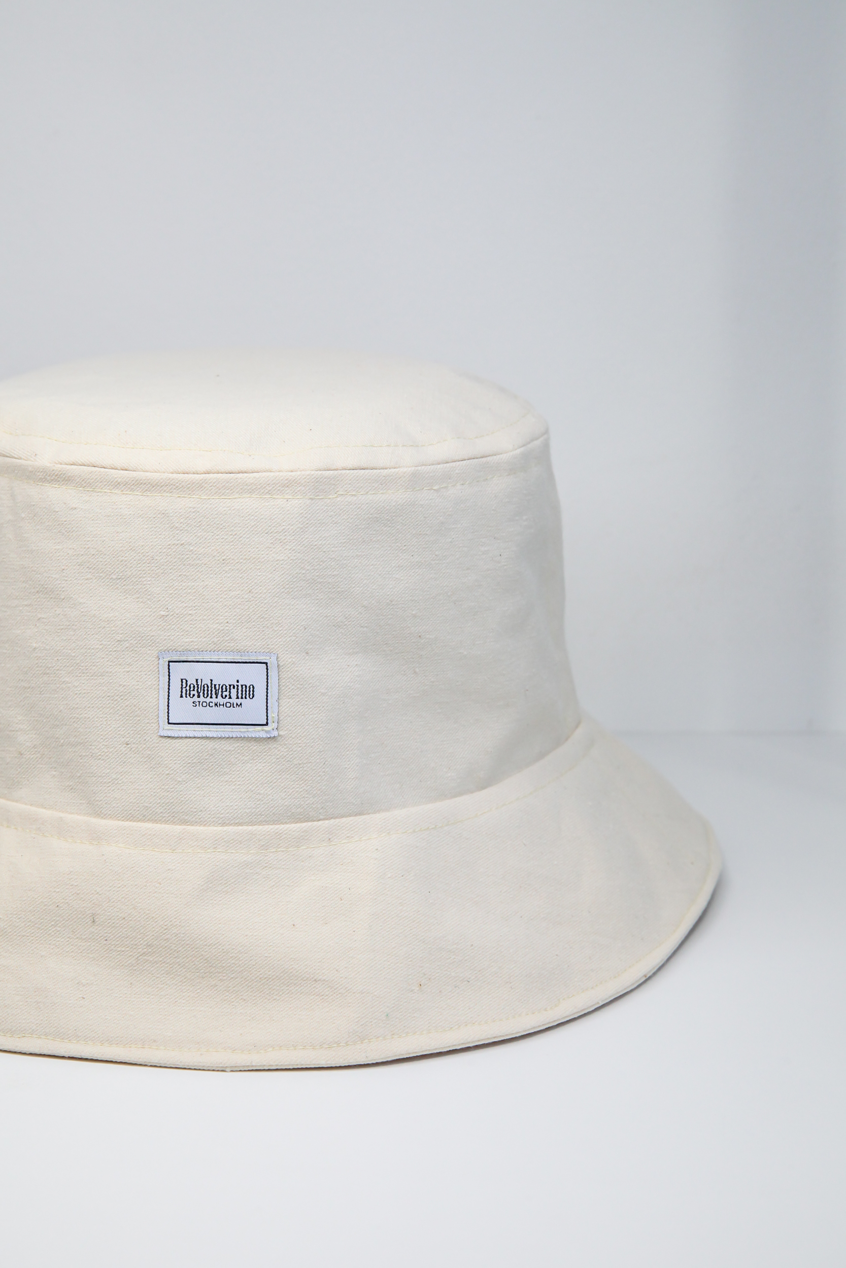 Beige rigid fabric bucket hat raw