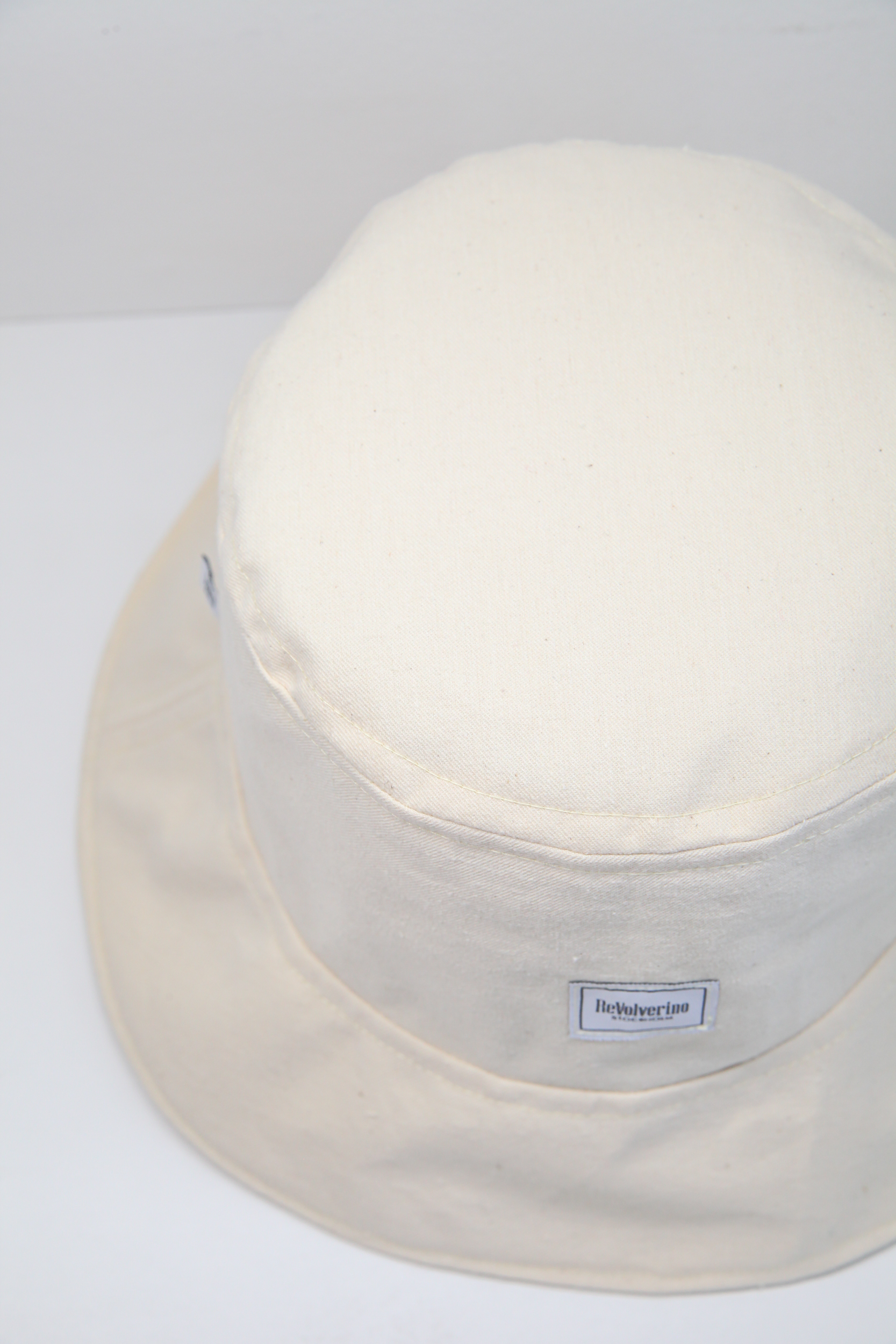 Beige rigid fabric bucket hat raw