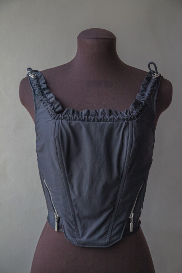 Shell corset top with frilled neckline and drawcords