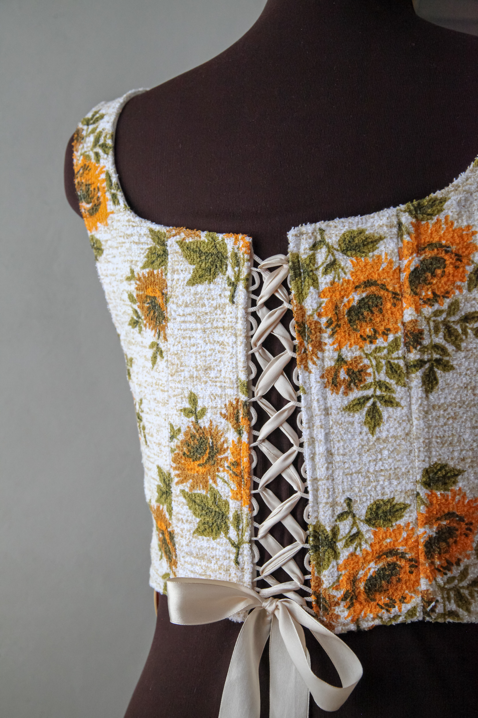 Upcycled terry corset top with sunflowers print, beige and orange