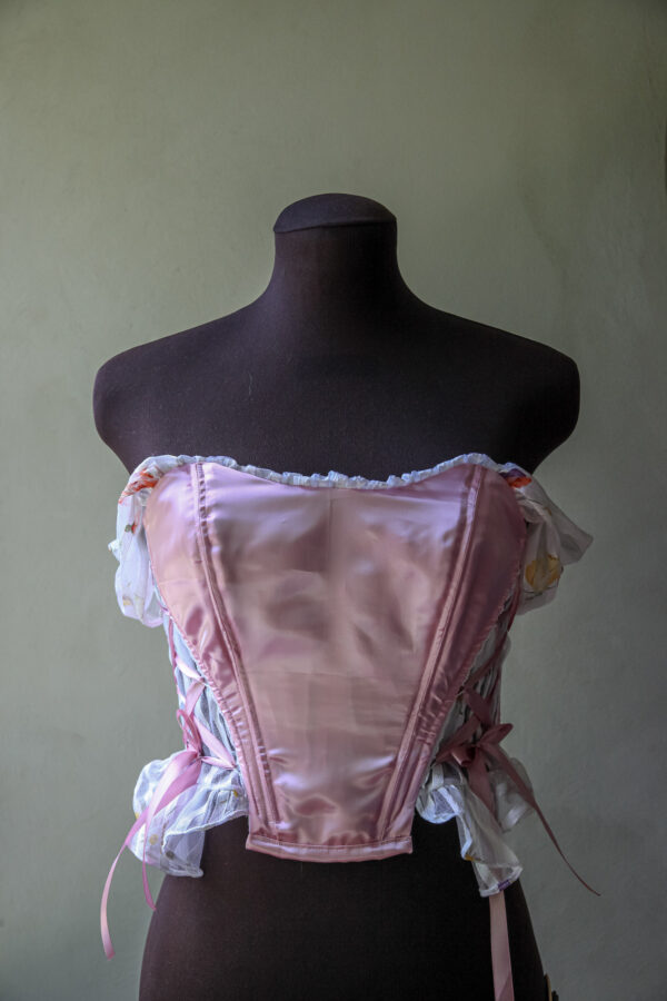 Satin corset top with hanging straps and side lacings